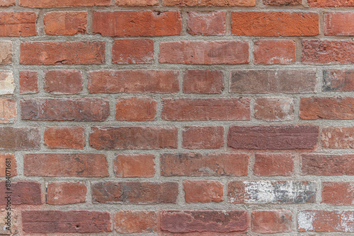 abstract background of an old red brick wall close up
