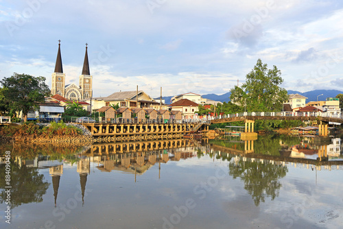 Stunning View of Cathedral of the Immaculate Conception as Seen from the Chantaboon Waterfront Community, Chanthaburi, Thailand photo