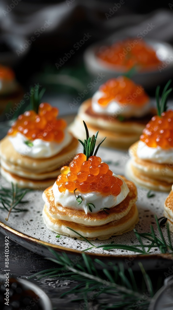 Delicious Russian Blini Topped with Caviar and Creme Fraiche Delicious Russian Blini Topped with Caviar and Creme Fraiche