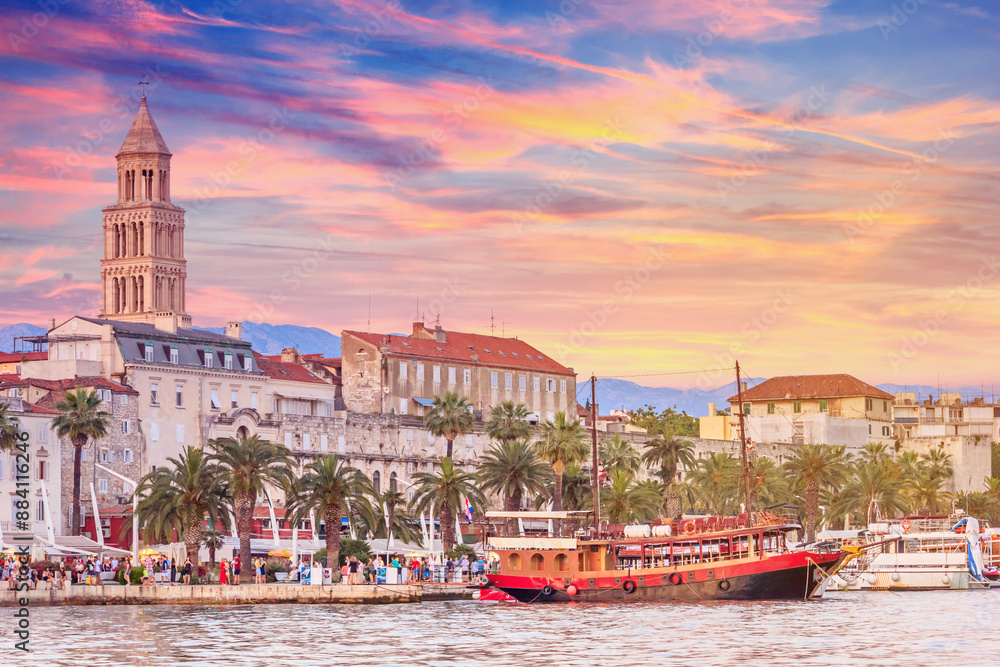 Coastal summer cityscape - view of the promenade the Old Town of Split with the Palace of Diocletian and bell tower of the Cathedral of Saint Domnius, the Adriatic coast of Croatia