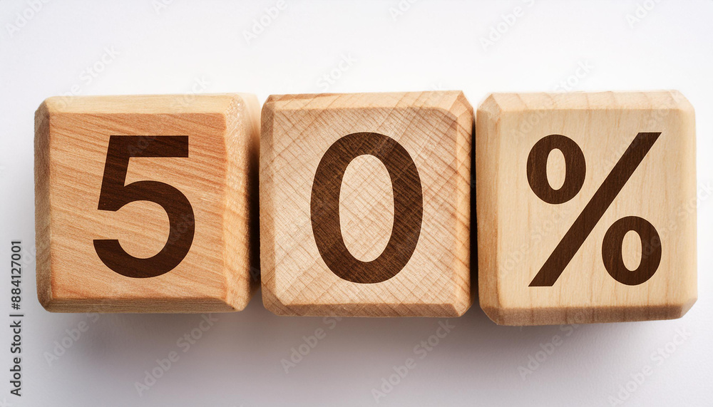 Wooden cubes with text 50% on white backdrop. Wood blocks, number percent. Close-up. Flat lay Wooden cubes with text 50% on white backdrop. Wood blocks, number percent. Close-up. Flat lay