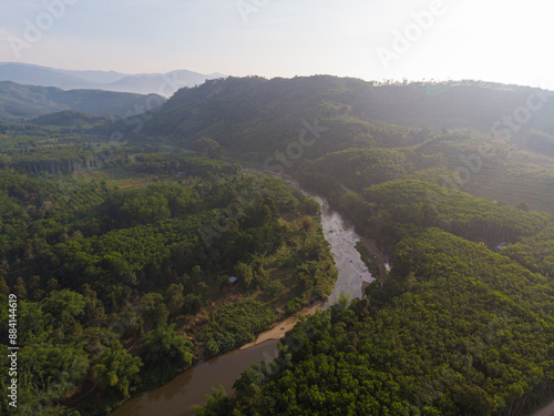 Aerial view green tropical rain forest river mountain sun rise