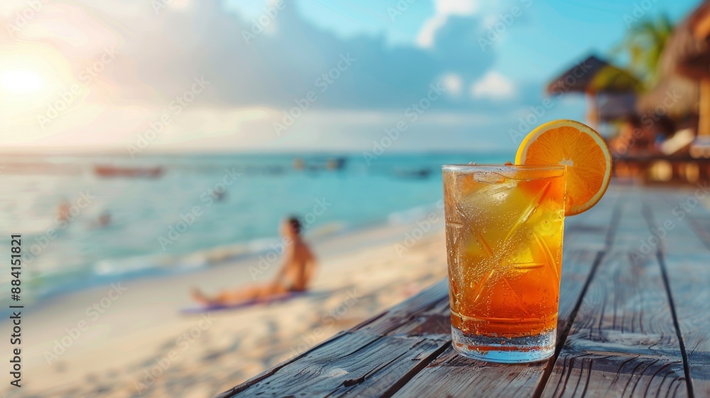 Obraz premium Tropical beach paradise with refreshing orange cocktail