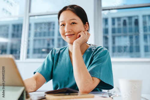 Young Asian woman studying to be a nurse photo