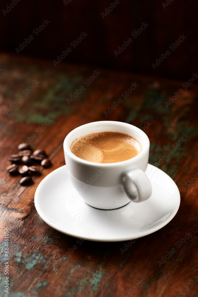 Cup of coffee on wooden background. Close up. Cup of coffee on wooden background. Close up.