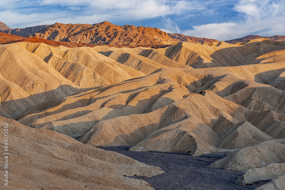 Naklejka premium Landscape at sunsett from Zabriskie Point of Golden Canyon, Death Valley National Park, California, USA