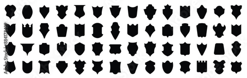 Set of shields silhouettes in different shapes. Black Heraldic badges shape label collection. Medieval escutcheon. Gothic style shields in different variations.