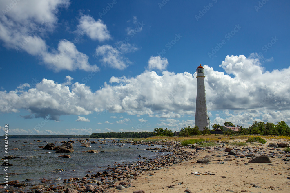 lighthouse of the 19th century Tahkuna Tuletorn on the Baltic coast in a strong wind during a sunny summer afternoon lighthouse of the 19th century Tahkuna Tuletorn on the Baltic coast in a strong wind during a sunny summer afternoon