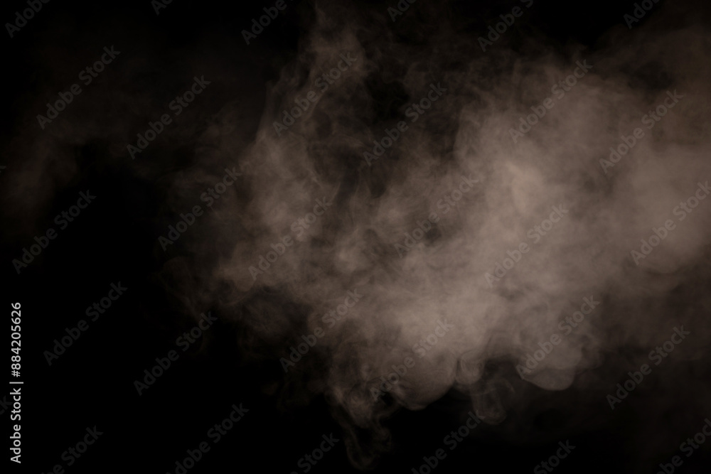 White steam on a black background. White steam on a black background.