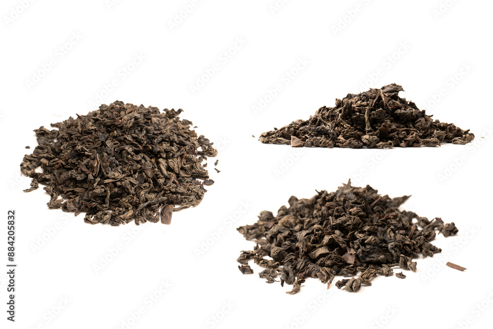 Dried tea leaves isolated on a white background. Dried tea leaves isolated on a white background.