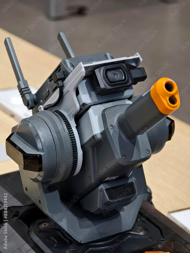 Modern military drone on table in the light store Modern military drone on table in the light store