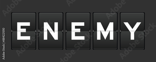 Black color analog flip board with word enemy on gray background