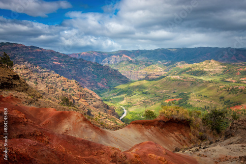 Obraz na płótnie Panoramic view of Waimea Canyon on the Hawaiian island of Kauai, USA against blue sky with clouds w salonie