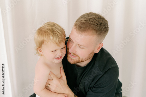 father and son playing 