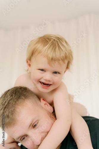 father and son playing 