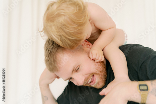 father and son playing 