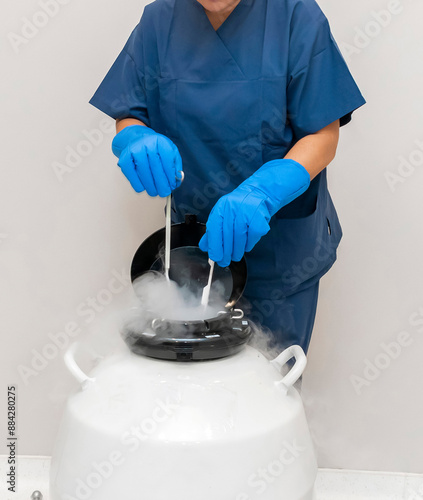 Konstfotografi Embryologists a Liquid Nitrogen Bank Containing Sperm and Eggs Samples