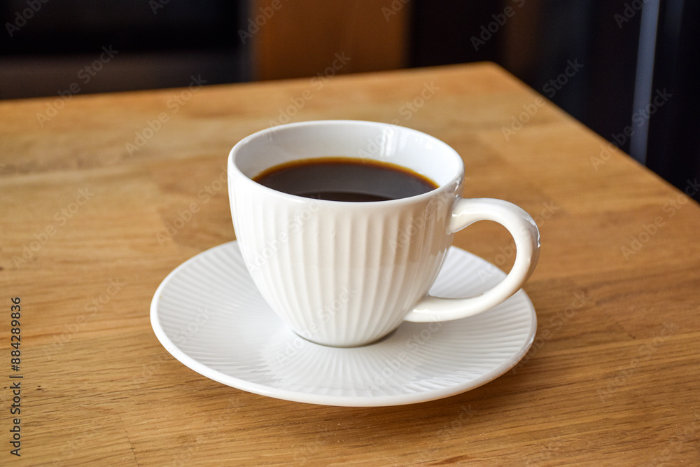 Freshly brewed coffee in a ceramic cup Freshly brewed coffee in a ceramic cup