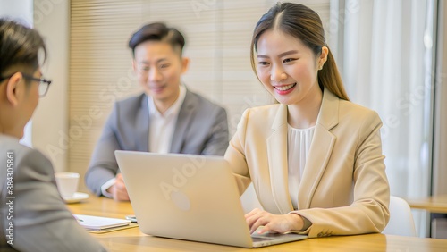 People working on laptop together in office, Business Meeting