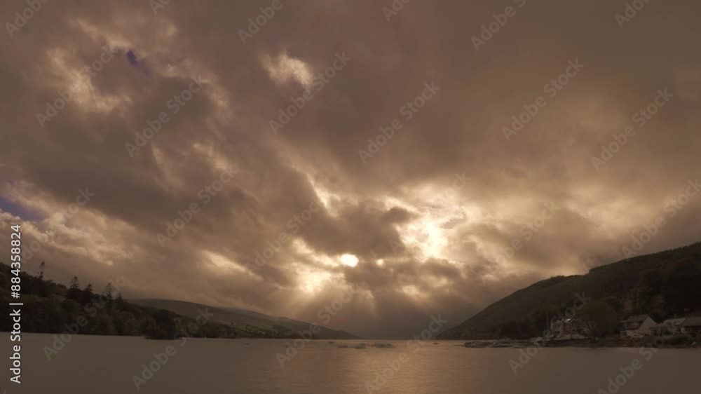 timelapse clouds rushing over Loch Tay, Scottish Highlands, light rays, dramatic lighting timelapse clouds rushing over Loch Tay, Scottish Highlands, light rays, dramatic lighting