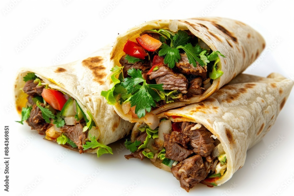 Burritos wraps with beef and vegetables on white background. Beef burrito, mexican food Burritos wraps with beef and vegetables on white background. Beef burrito, mexican food