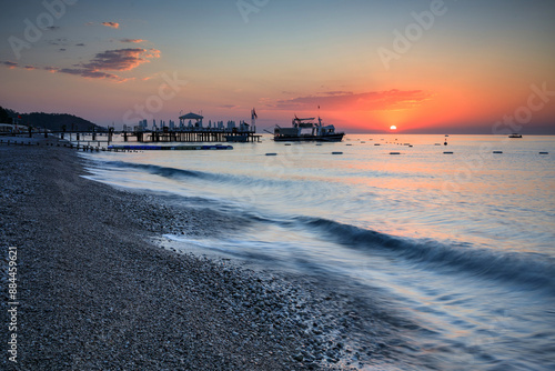 Fototapeta Naklejka Na Ścianę i Meble -  Beautiful sunrise at the beach of Turkish Riviera, Tekirova near Kemer. Turkey