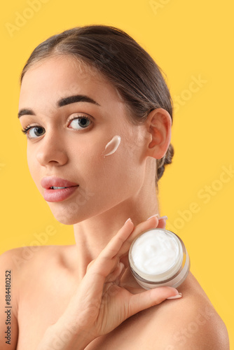 Young woman with jar of nat...