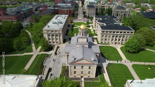 IOWA - 6.24.2024 - Very good aerial view moving up over the Old Capitol Building on the University of Iowa campus. photo