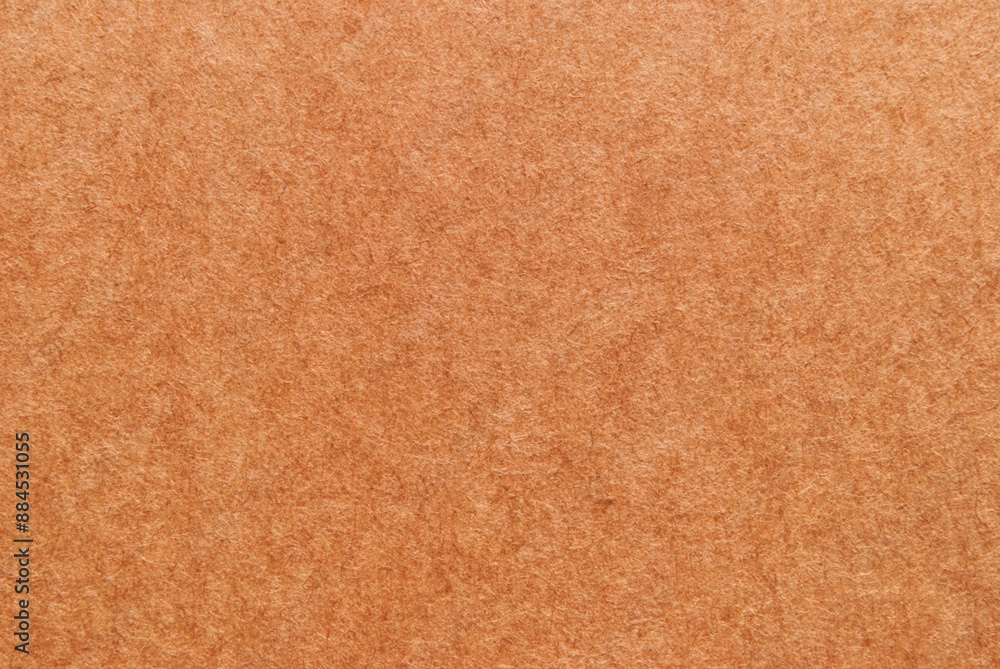 Fototapeta premium A sheet of brown recycled cardboard texture as background