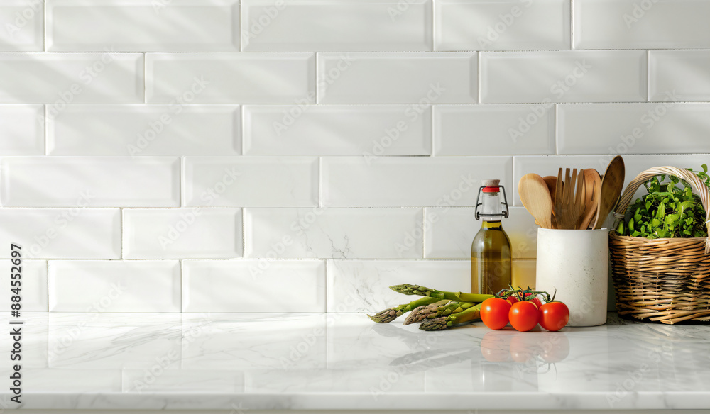 Kitchen Countertop with Olive Oil, Asparagus, Tomatoes, and Utensils. Kitchen Countertop with Olive Oil, Asparagus, Tomatoes, and Utensils.