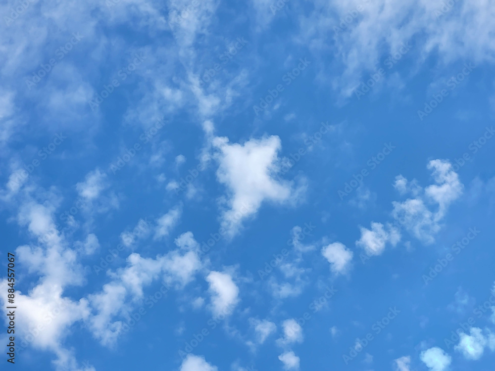 Beautiful blue sky and feathery white clouds nice bright day Beautiful blue sky and feathery white clouds nice bright day