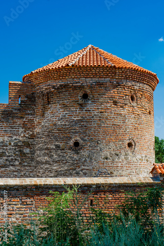 Majestic Fetislam fortress in Serbia standing proud under the clear sky photo