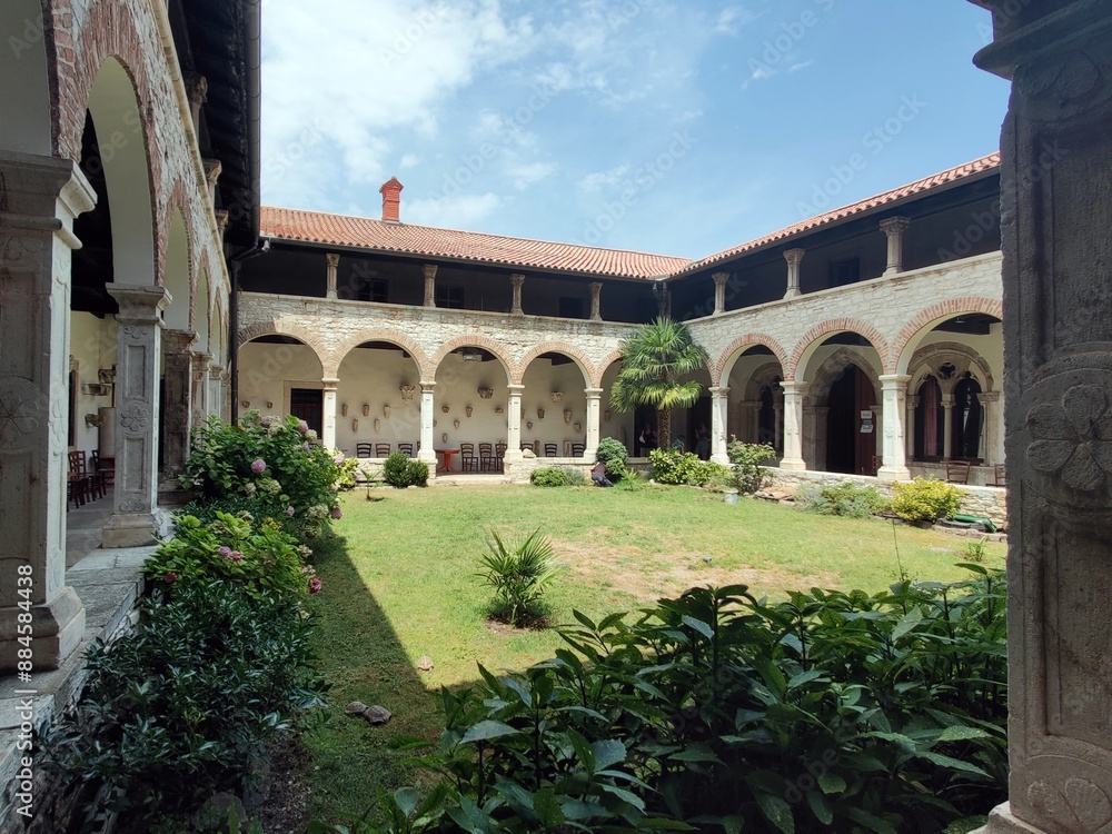 Fototapeta premium Church and monastery of St. Francis in Pula, Croatia. The church, in the late Romanesque style and with Gothic adornments, was built in 1314