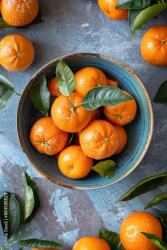 Fresh Dancy Tangerine in a bowl, Top View photo