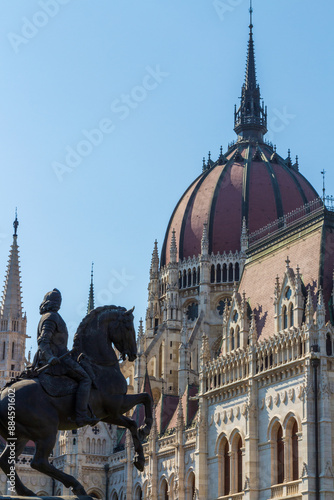 Photography A horse statue near the Hungarian parliament bulding in Budapest