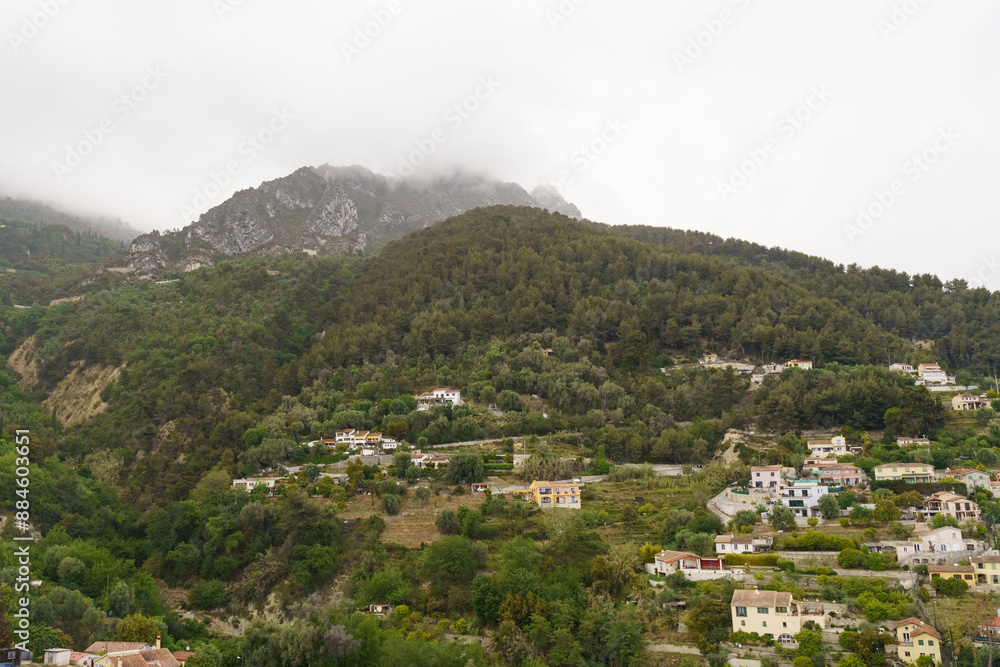 A View of a Village in the Italian Alps on a Cloudy Day A View of a Village in the Italian Alps on a Cloudy Day