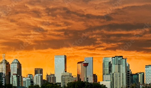 Stormy skies highlighting the Calgary skyline before a thunderstorm at sunset in July