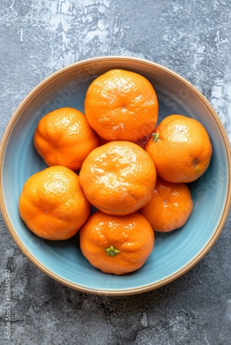 Fresh Sunburst Tangerine Orange in a bowl, Top View, Golden Ratio, Natural Light