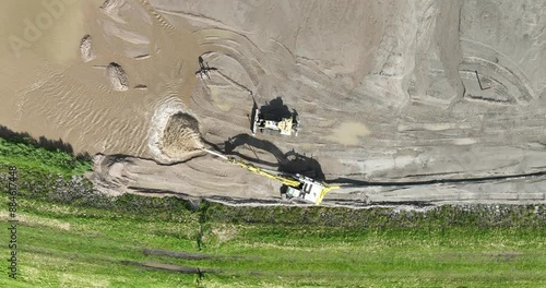 Flood protection works, rising aerial, reinforcing of dykes, aerial view. The Netherlands. photo