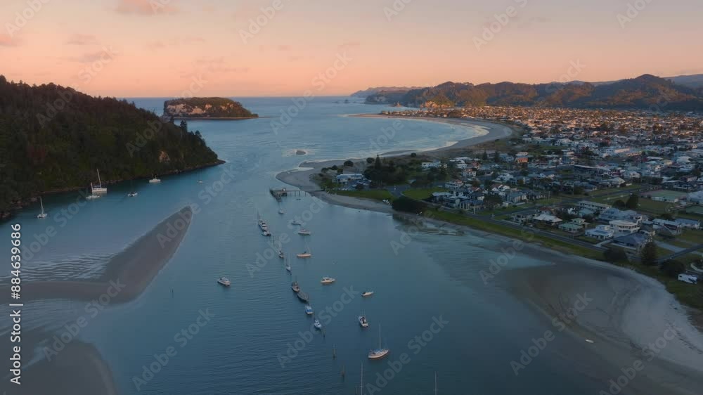 Harbour, beach and the township of Whangamata, Coromandel Peninsula, New Zealand. Harbour, beach and the township of Whangamata, Coromandel Peninsula, New Zealand.