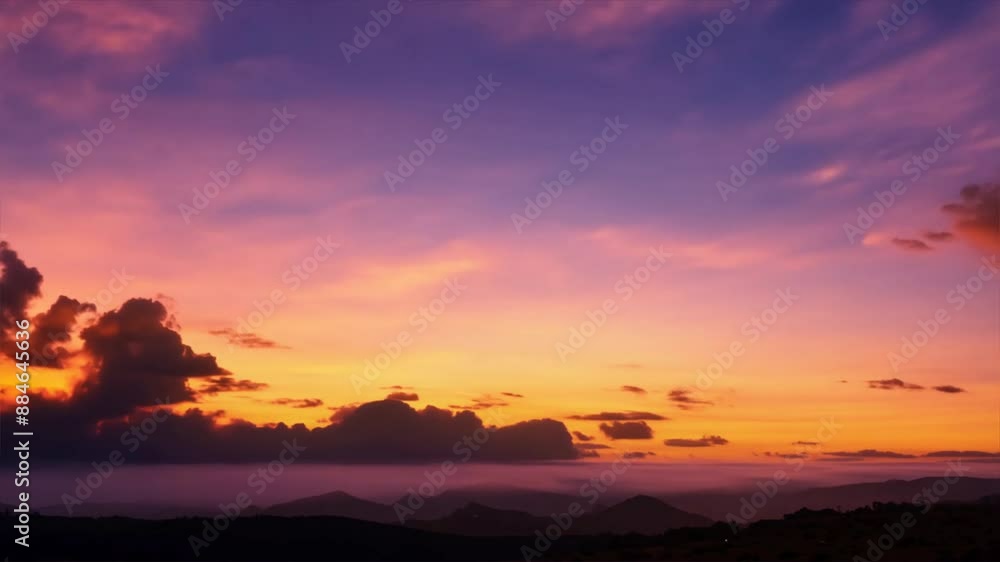 Sunset Sky Clouds in the evening with Red, Orange, Yellow and purple sunlight on Golden hour after sundown, Romantic sky in summer on Dusk Twilight Sunset Sky Clouds in the evening with Red, Orange, Yellow and purple sunlight on Golden hour after sundown, Romantic sky in summer on Dusk Twilight
