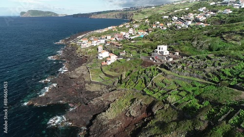 Aerial view of coastal cliffs on Freguesia Feteira - Terceira Island, Azores archipelago, Portugal photo