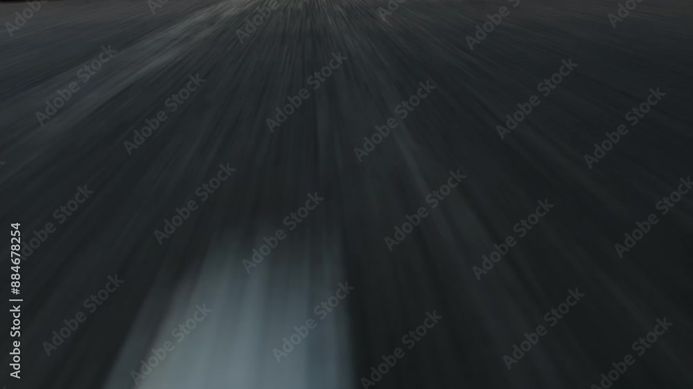 Fast Low angle POV driving on asphalt road with lane markings