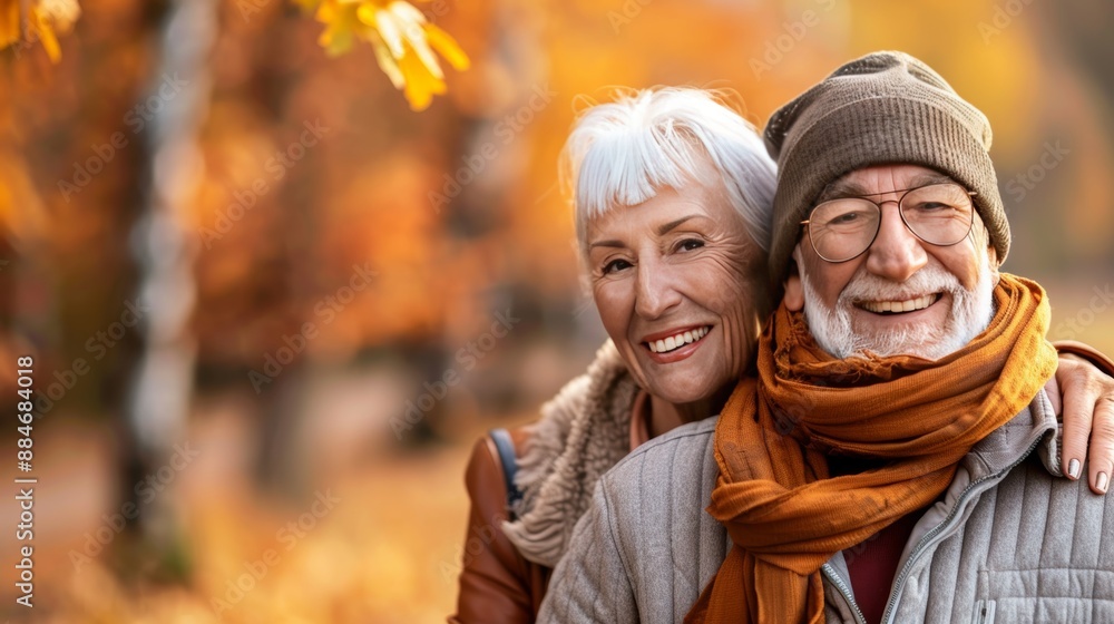 Happy elderly couple on park bench, retirement leisure concept with blurred background Happy elderly couple on park bench, retirement leisure concept with blurred background