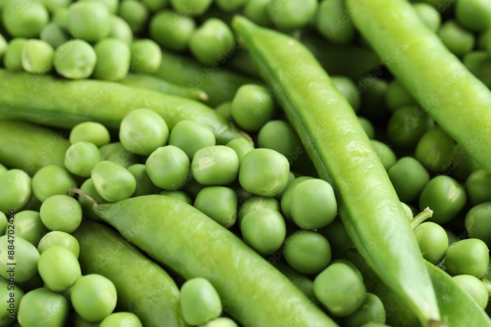 Many fresh green pods and peas as background, closeup Many fresh green pods and peas as background, closeup