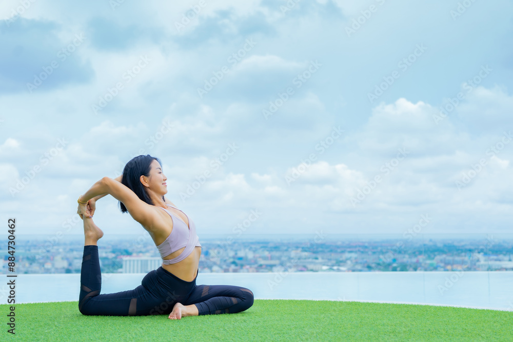 yoga, Asian woman wearing yoga clothes practicing yoga, Asia group of women exercising healthy lifestyle in outdoor fitness studio. swimming pool. Sport activity, gymnastics or ballet dancing class.