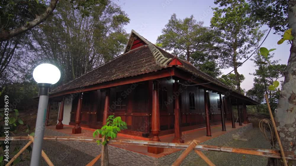 Traditional architecture of a tiled roof house in Kerala, using mainly wood Traditional architecture of a tiled roof house in Kerala, using mainly wood