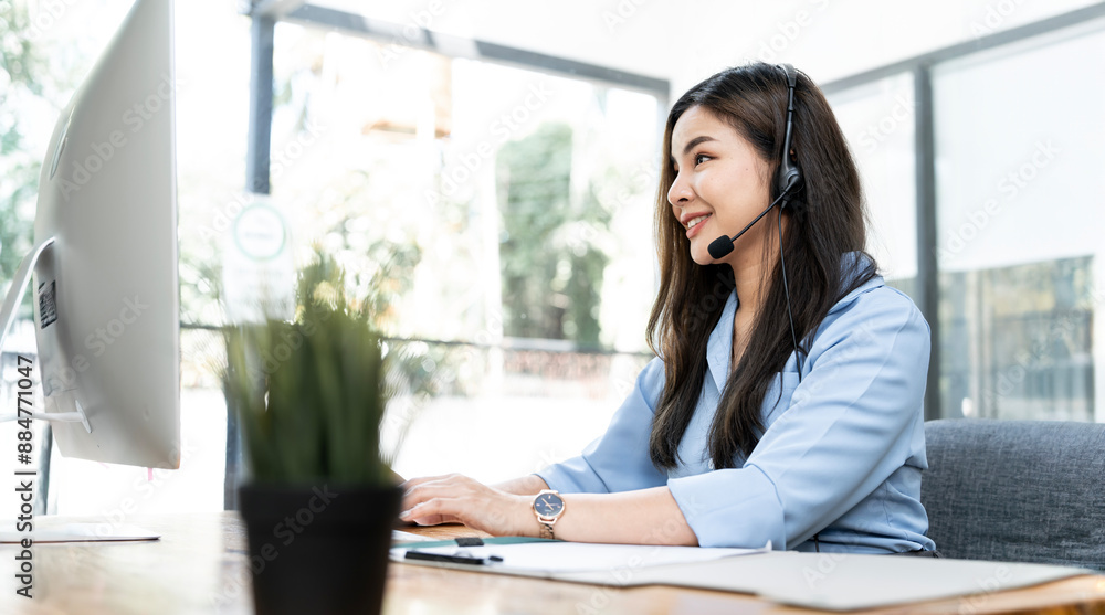 Young friendly operator woman agent with headsets working in a call centre. Young friendly operator woman agent with headsets working in a call centre.