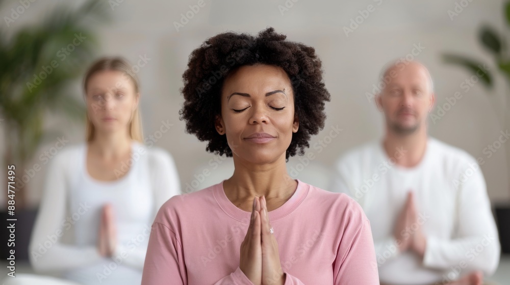Group meditation session with diverse participants practicing mindfulness.. Group meditation session with diverse participants practicing mindfulness..