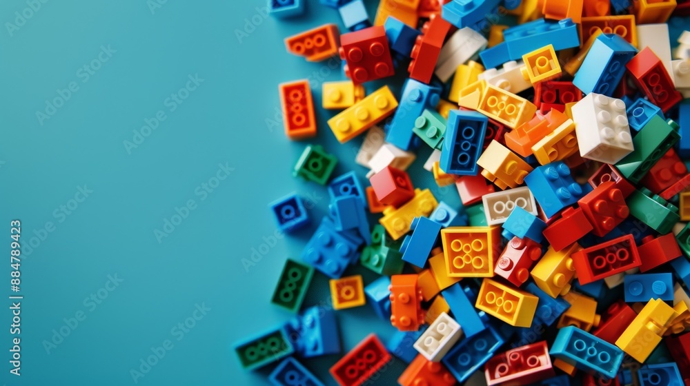 A pile of colorful blocks scattered all over the place. A pile of colorful blocks scattered all over the place.